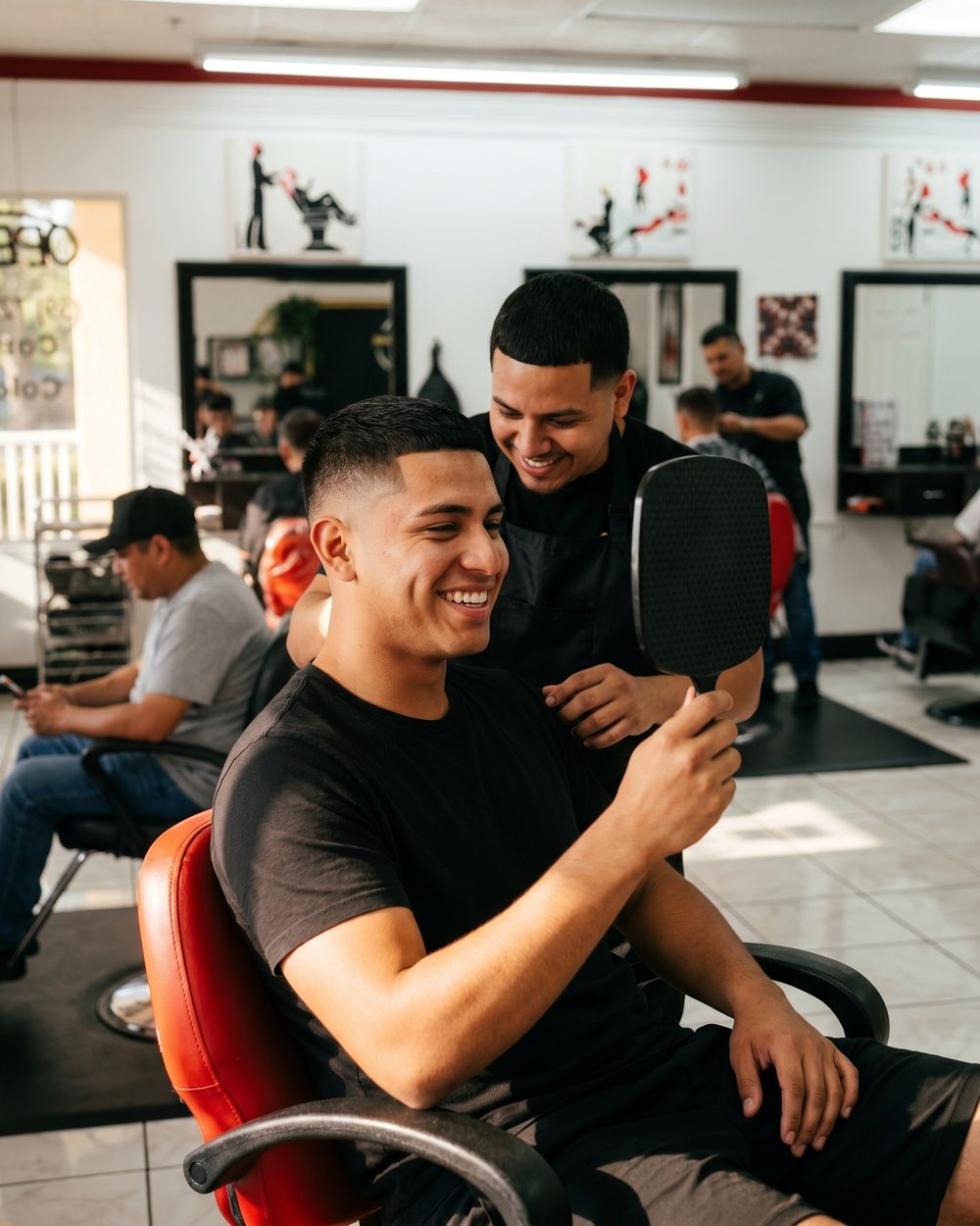 Skin fade reveal by a barber at Hair Creations M&M, East Naples FL