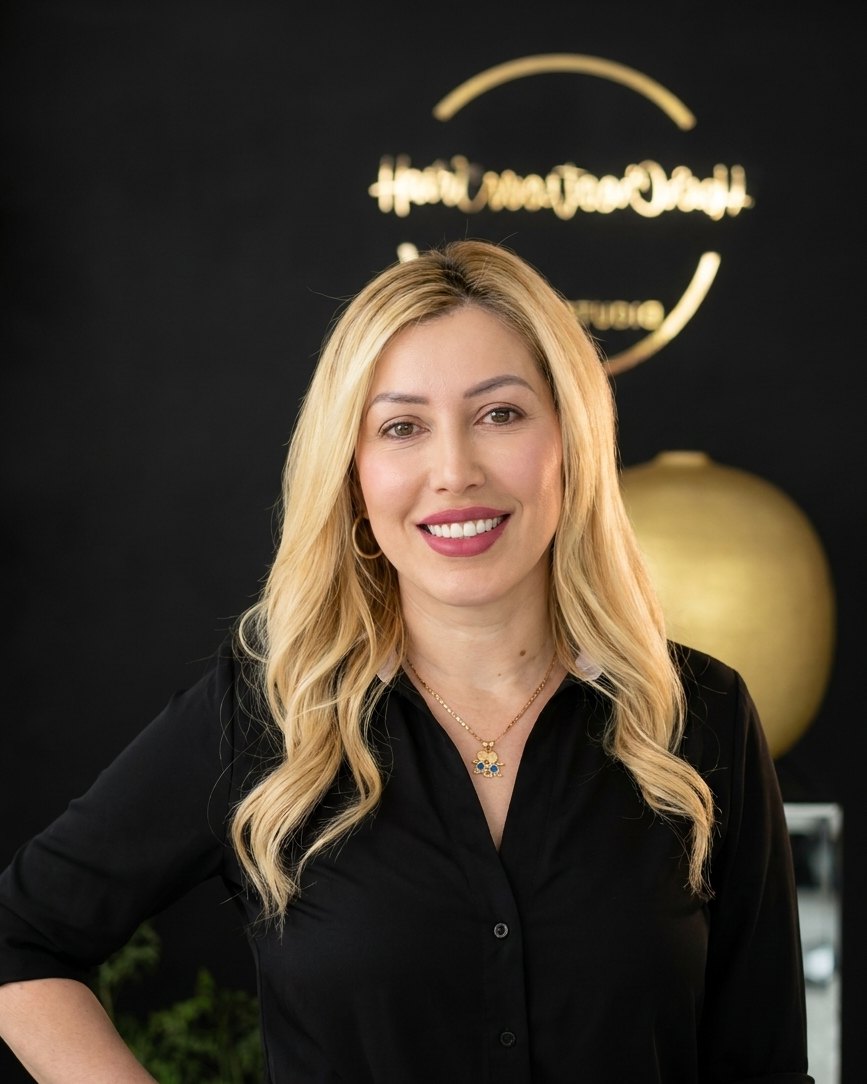 Maribel, owner and master stylist at Hair Creations M&M, Naples FL