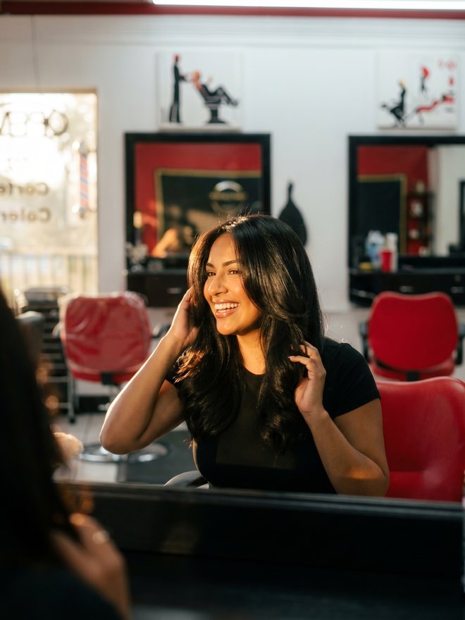 Fresh blowout, happy guest at a Naples FL salon